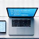 Symbol für flexible Lieferoptionen: Laptop, Tablet und Whiteboard